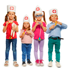 stock-photo-92745853-kids-with-medical-caps-and-toy-doctor-tools.jpg